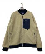 Patagoniaパタゴニア）の古着「ボアジャケット」｜アイボリー×ネイビー