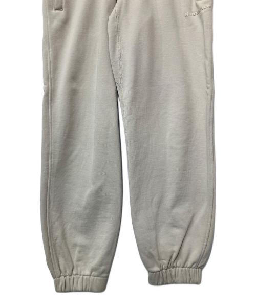 adidas（アディダス）adidas (アディダス) Humanrace (ヒューマンレース) スウェットパンツ ベージュ サイズ:Mの古着・服飾アイテム