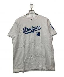 UNDEFEATED×LA Dodgers×New Era（アンディフィーテッド×ロサンゼルス・ドジャース×ニューエラ）の古着「プリントTシャツ」｜ホワイト×ブルー