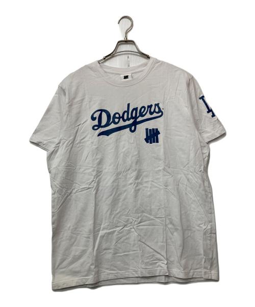 UNDEFEATED（アンディフィーテッド）UNDEFEATED (アンディフィーテッド) LA DODGERS (ロサンゼルス・ドジャース) New Era (ニューエラ) プリントTシャツ ホワイト×ブルー サイズ:XLの古着・服飾アイテム