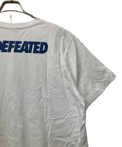 UNDEFEATED（アンディフィーテッド）UNDEFEATED (アンディフィーテッド) LA DODGERS (ロサンゼルス・ドジャース) New Era (ニューエラ) プリントTシャツ ホワイト×ブルー サイズ:XLの古着・服飾アイテム