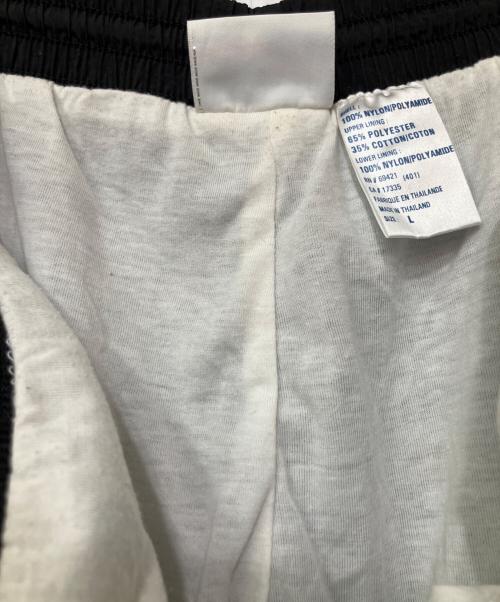 REEBOK（リーボック）REEBOK (リーボック) ナイロンパンツ ブラック サイズ:Lの古着・服飾アイテム