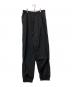 REEBOK（リーボック）の古着「ナイロンパンツ」｜ブラック