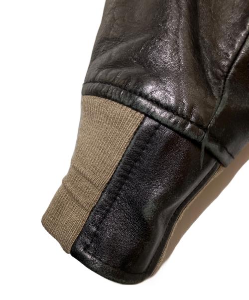 JOHN LAWRENCE SULLIVAN（ジョン ローレンス サリバン）JOHN LAWRENCE SULLIVAN (ジョン ローレンス サリバン) スタジャン ベージュ×ブラック サイズ:36の古着・服飾アイテム