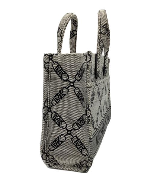 MICHAEL KORS（マイケル・コース）MICHAEL KORS (マイケル・コース) スモール イースト ウエスト メッセンジャー バッグ グレー×ブラックの古着・服飾アイテム