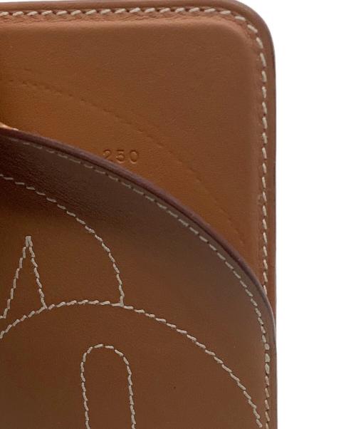 HERMES（エルメス）HERMES (エルメス) エマン・シュヴァル　ヴォースイフト　カードケース ゴールドの古着・服飾アイテム