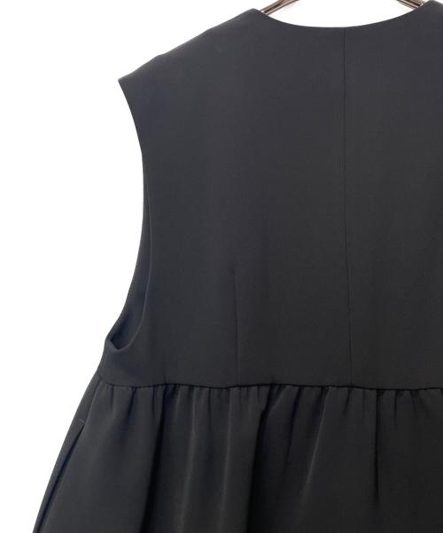 chignon（シニヨン）chignon (シニヨン) ダブルクロスペプラムベスト ブラック サイズ:F 未使用品の古着・服飾アイテム