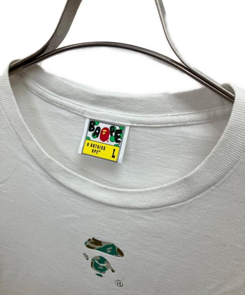 A BATHING APE（アベイシングエイプ）A BATHING APE (アベイシングエイプ) Liquid Camo Small Ape Face Tee ホワイト サイズ:Lの古着・服飾アイテム