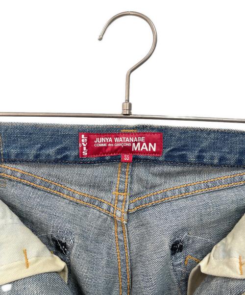 COMME des GARCONS JUNYA WATANABE MAN（コム デ ギャルソン ジュンヤ ワタナベ マン）COMME des GARCONS JUNYA WATANABE MAN (コム デ ギャルソン ジュンヤ ワタナベ マン) LEVI'S (リーバイス) デニムパンツ ブルー サイズ:SSの古着・服飾アイテム