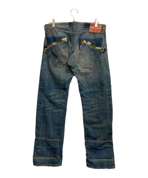 COMME des GARCONS JUNYA WATANABE MAN（コム デ ギャルソン ジュンヤ ワタナベ マン）COMME des GARCONS JUNYA WATANABE MAN (コム デ ギャルソン ジュンヤ ワタナベ マン) LEVI'S (リーバイス) デニムパンツ ブルー サイズ:XSの古着・服飾アイテム