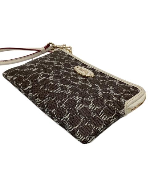 COACH（コーチ）COACH (コーチ) ミニポーチ ブラウン×ホワイトの古着・服飾アイテム