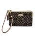 COACH（コーチ）の古着「ミニポーチ」｜ブラウン×ホワイト