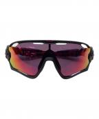 OAKLEYオークリー）の古着「サングラス」｜レッド×ブラック