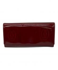 Cartier（カルティエ）の古着「ハッピーバースデー　長財布」｜レッド