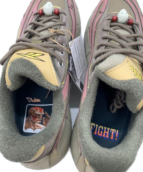 REEBOK Zig Kinetica（リーボック ジグ キネティカ）REEBOK Zig Kinetica (リーボック ジグ キネティカ) STREET FIGHTER (ストリートファイター) スニーカー オリーブ サイズ:27.5 未使用品の古着・服飾アイテム