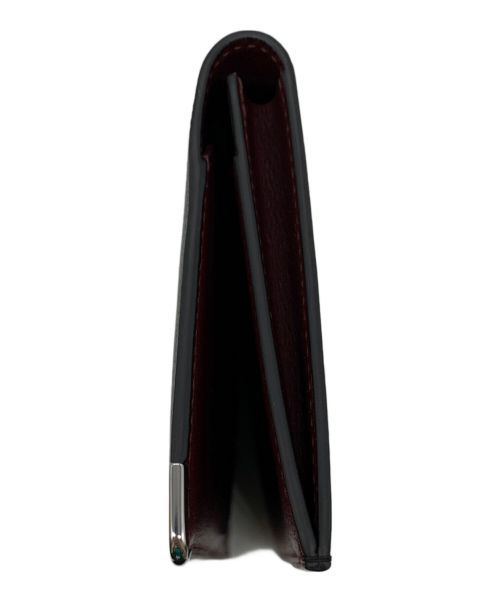 Cartier（カルティエ）Cartier (カルティエ) インターナショナル ウォレット ブラックの古着・服飾アイテム