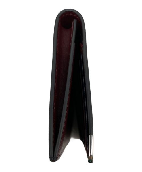 Cartier（カルティエ）Cartier (カルティエ) インターナショナル ウォレット ブラックの古着・服飾アイテム