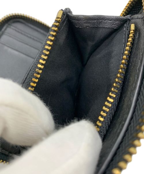 TORY BURCH（トリーバーチ）TORY BURCH (トリーバーチ) 2つ折り財布 ブラックの古着・服飾アイテム