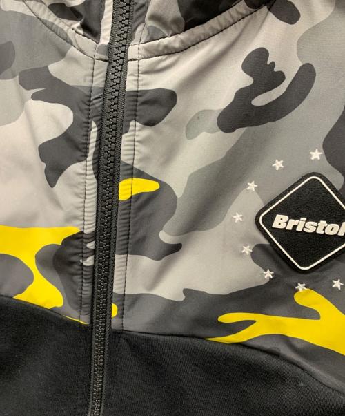 F.C.R.B.（エフシーレアルブリストル）F.C.R.B. (エフシーレアルブリストル) ジャケット ブラック×イエロー サイズ:Mの古着・服飾アイテム