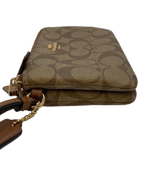 COACH（コーチ）COACH (コーチ) ポーチ ブラウンの古着・服飾アイテム