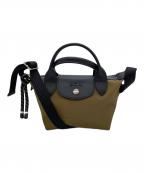 LONGCHAMPロンシャン）の古着「ショルダーバッグ」｜オークル×ブラック