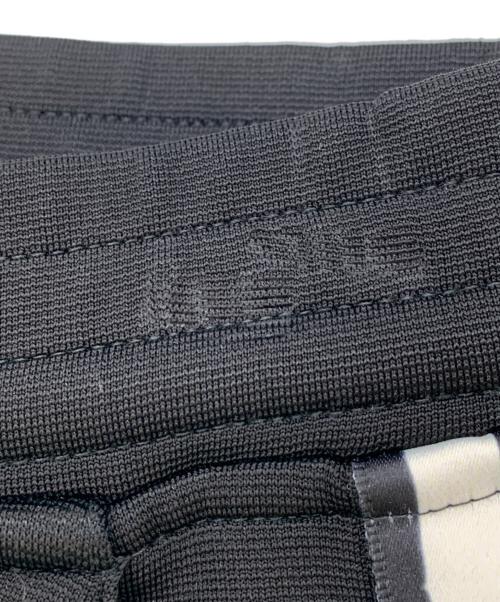 NEIL BARRETT（ニールバレット）NEIL BARRETT (ニールバレット) サイドストライプトラックパンツ ブラック サイズ:XSの古着・服飾アイテム