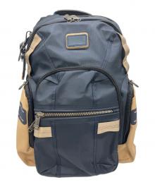 TUMI（トゥミ）の古着「リュック」｜ネイビー×ベージュ
