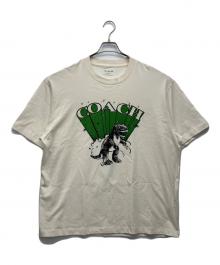 COACH（コーチ）の古着「ダイナソーTシャツ」｜ホワイト