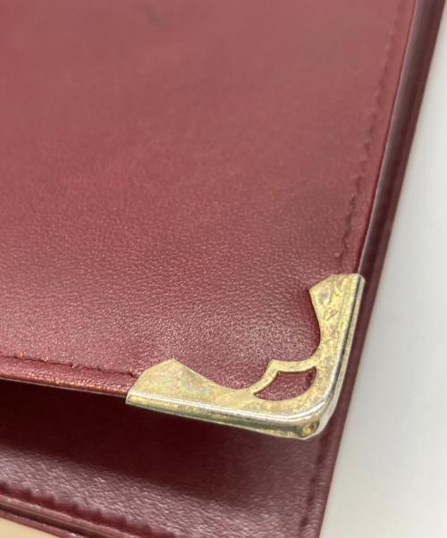 Cartier（カルティエ）Cartier (カルティエ) 札入れ ワインレッドの古着・服飾アイテム