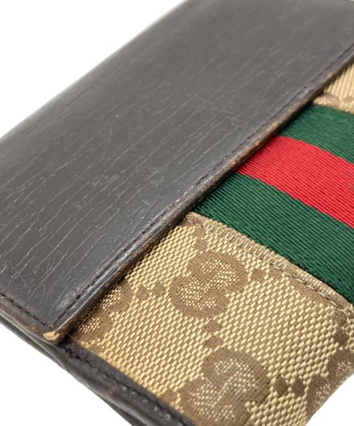 GUCCI（グッチ）GUCCI (グッチ) 2つ折り財布 ブラウンの古着・服飾アイテム