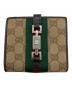 GUCCI（グッチ）の古着「2つ折り財布」｜ブラウン