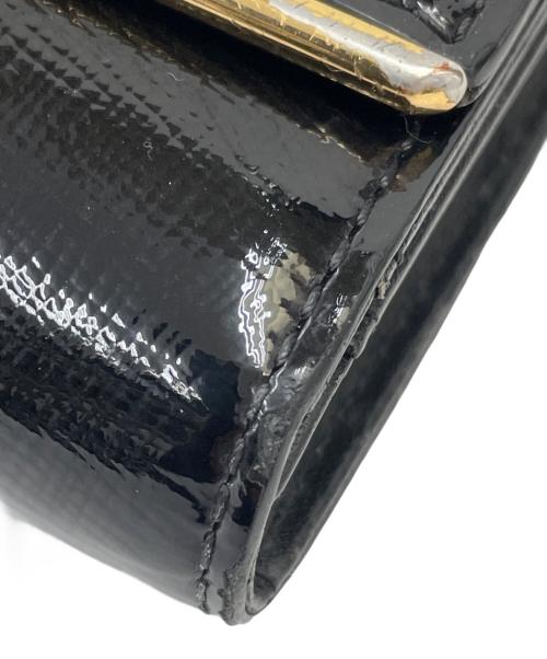 MCM（エムシーエム）MCM (エムシーエム) 2つ折り財布 ブラック×ゴールドの古着・服飾アイテム