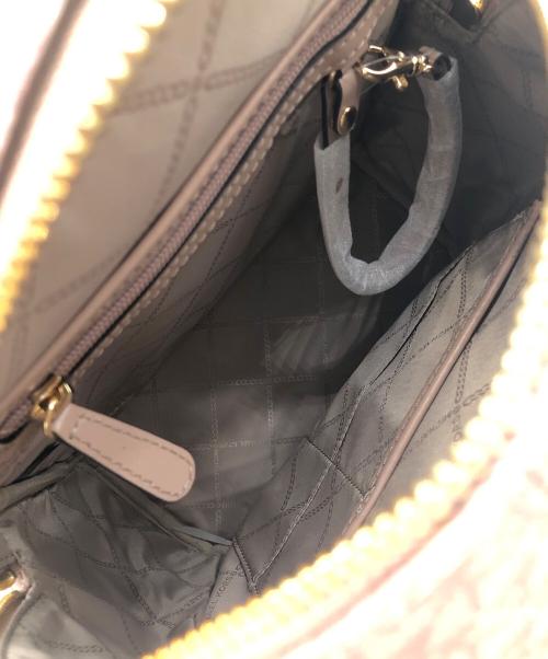 MICHAEL KORS（マイケル・コース）MICHAEL KORS (マイケル・コース) バックパック ピンク×ホワイトの古着・服飾アイテム