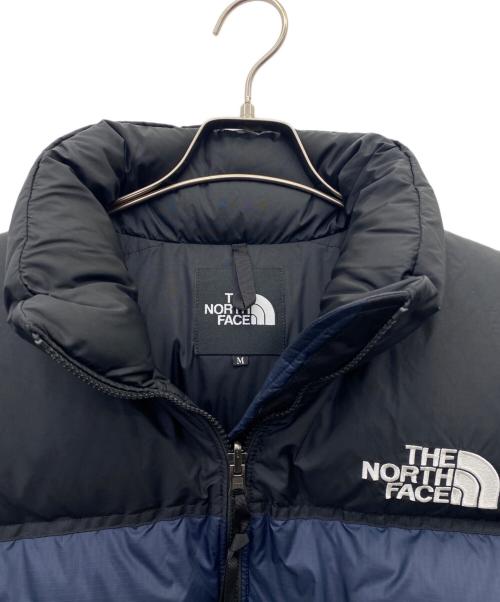 THE NORTH FACE（ザ ノース フェイス）THE NORTH FACE (ザ ノース フェイス) ヌプシジャケット ネイビー×ブラック サイズ:Mの古着・服飾アイテム