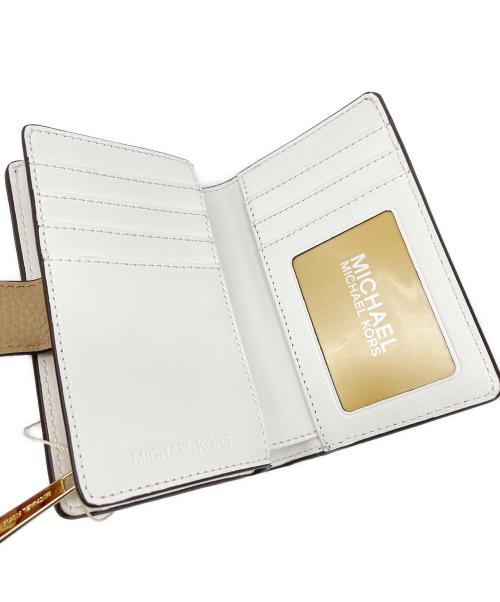 MICHAEL KORS（マイケルコース）MICHAEL KORS (マイケルコース) 2つ折り財布 ブラウンの古着・服飾アイテム