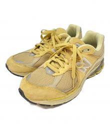 NEW BALANCE×AURALEE（ニューバランス×オーラリー）の古着「2002R」｜イエロー