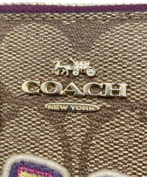 COACH（コーチ）COACH (コーチ) DISNEY (ディズニー) 長財布 ブラウンの古着・服飾アイテム