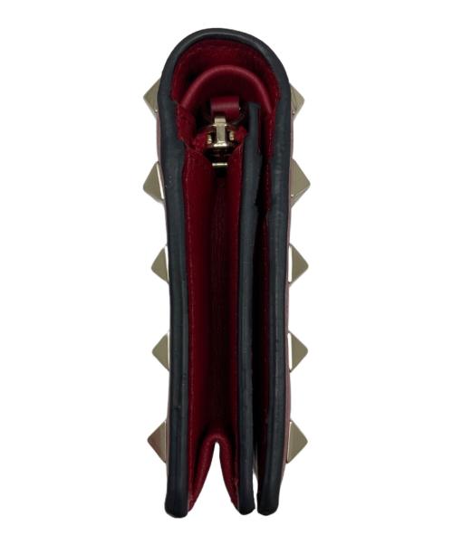 VALENTINO GARAVANI（ヴァレンティノ・ガラヴァーニ）VALENTINO GARAVANI (ヴァレンティノ・ガラヴァーニ) 2つ折り財布 レッドの古着・服飾アイテム