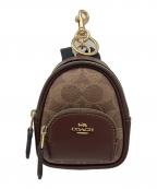 COACHコーチ）の古着「チャームリュック」｜ブラウン×ベージュ