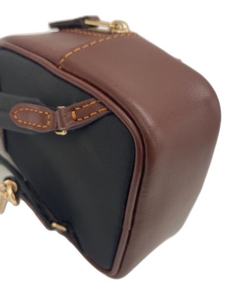 COACH（コーチ）COACH (コーチ) チャームリュック ブラウン×ベージュの古着・服飾アイテム