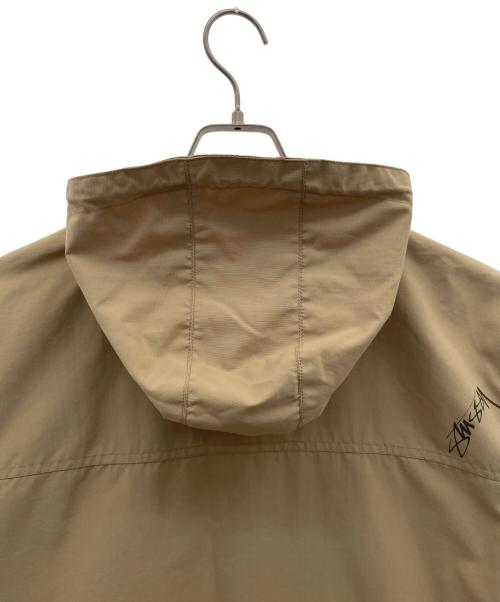 stussy（ステューシー）stussy (ステューシー) ナイロンマウンテンパーカー ベージュ サイズ:Lの古着・服飾アイテム