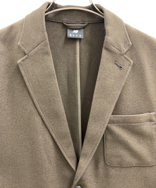 NEW BALANCE（ニューバランス）NEW BALANCE (ニューバランス) NEW BALANCE　THE CITY カルゼイージージャケット ブラウン サイズ:XLの古着・服飾アイテム