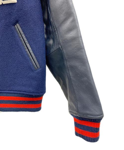 X-LARGE（エクストララージ）X-LARGE (エクストララージ) X-LARGE（エクストララージ）スタジャン ブルー×レッド サイズ:Mの古着・服飾アイテム