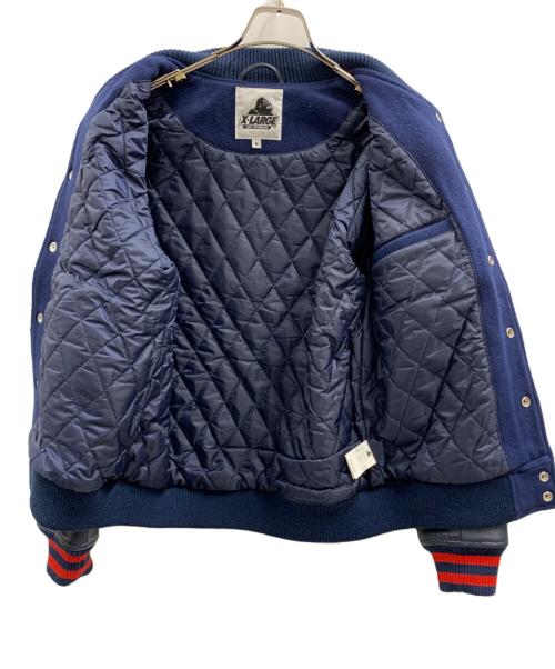 X-LARGE（エクストララージ）X-LARGE (エクストララージ) X-LARGE（エクストララージ）スタジャン ブルー×レッド サイズ:Mの古着・服飾アイテム