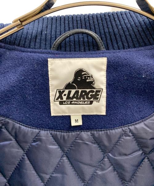 X-LARGE（エクストララージ）X-LARGE (エクストララージ) X-LARGE（エクストララージ）スタジャン ブルー×レッド サイズ:Mの古着・服飾アイテム