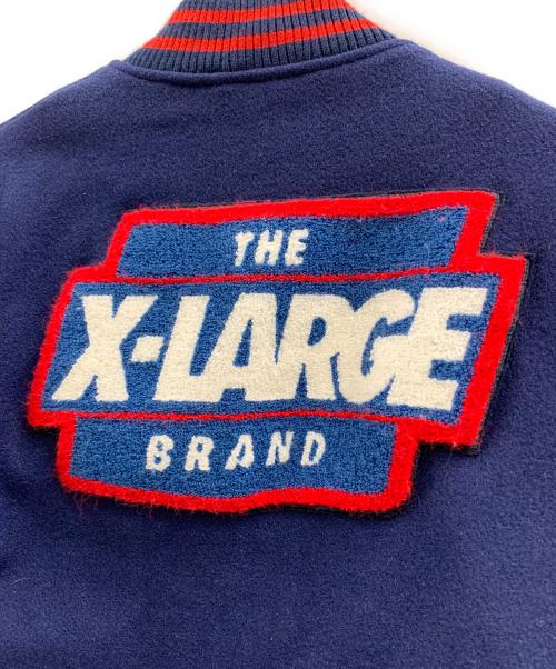 X-LARGE（エクストララージ）X-LARGE (エクストララージ) X-LARGE（エクストララージ）スタジャン ブルー×レッド サイズ:Mの古着・服飾アイテム