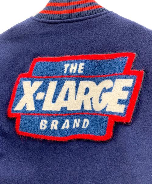 X-LARGE（エクストララージ）X-LARGE (エクストララージ) X-LARGE（エクストララージ）スタジャン ブルー×レッド サイズ:Mの古着・服飾アイテム