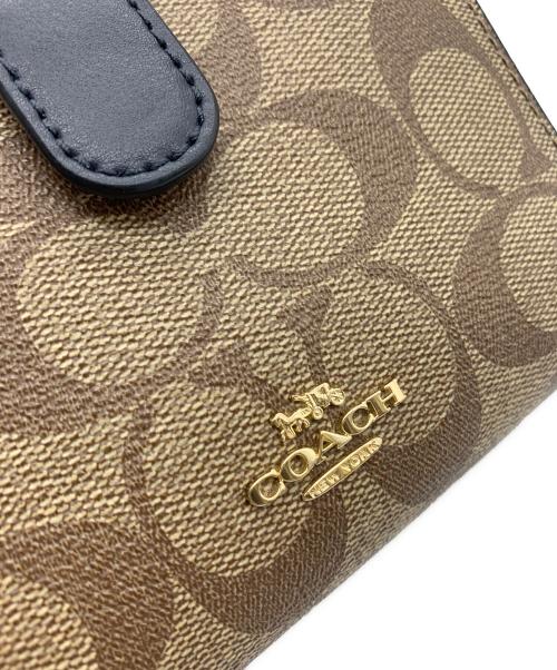 COACH（コーチ）COACH (コーチ) COACH　2つ折り財布 ブラウンの古着・服飾アイテム