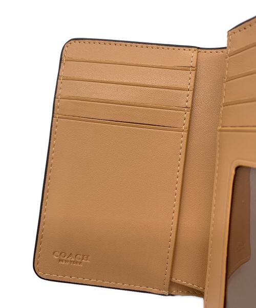 COACH（コーチ）COACH (コーチ) COACH　2つ折り財布 アイボリーの古着・服飾アイテム