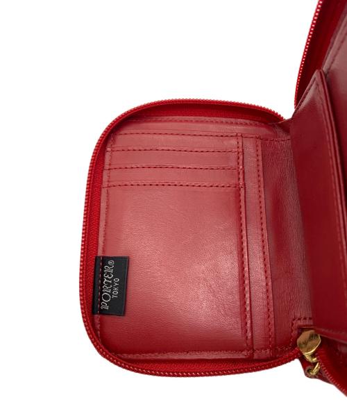 PORTER（ポーター）PORTER (ポーター) stussy (ステューシー) PORTER　stussy　2つ折り財布 レッドの古着・服飾アイテム